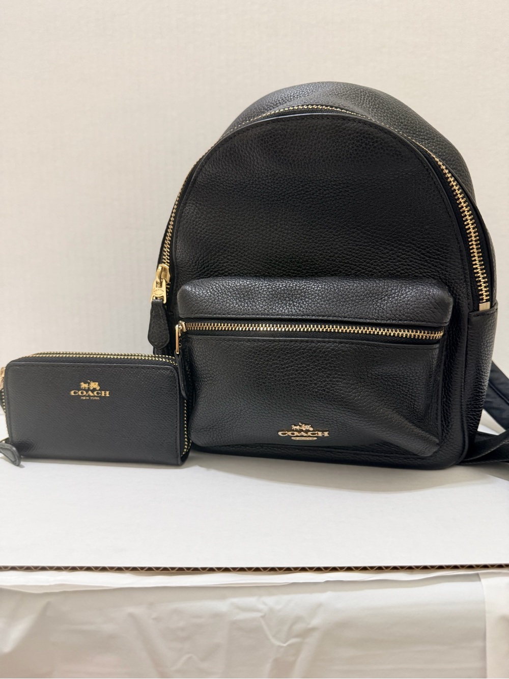 Coach Black Pebble Leather Mini Backpack with Gold Accents and Matching Wallet